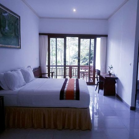 Отель Ubud River Side House Экстерьер фото