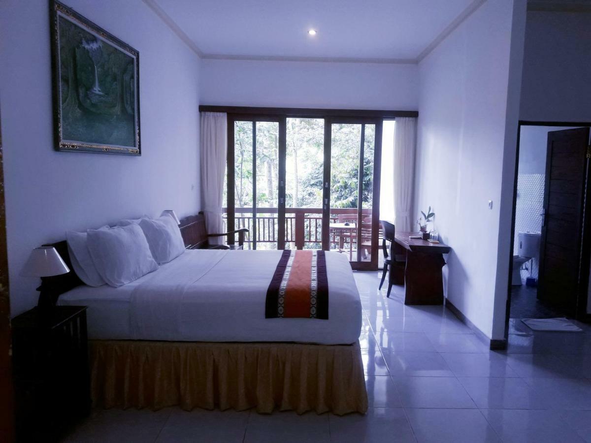 Отель Ubud River Side House Экстерьер фото