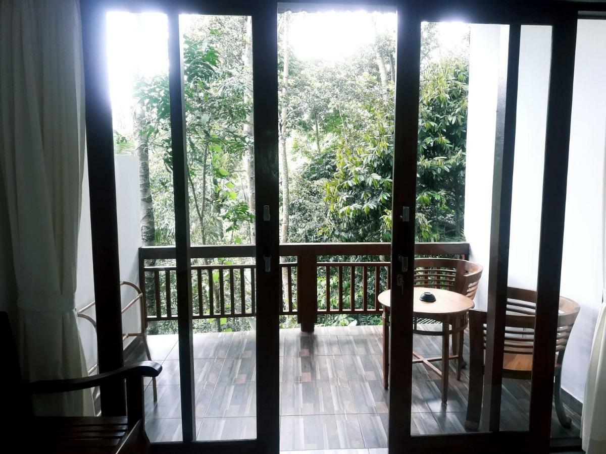 Отель Ubud River Side House Экстерьер фото
