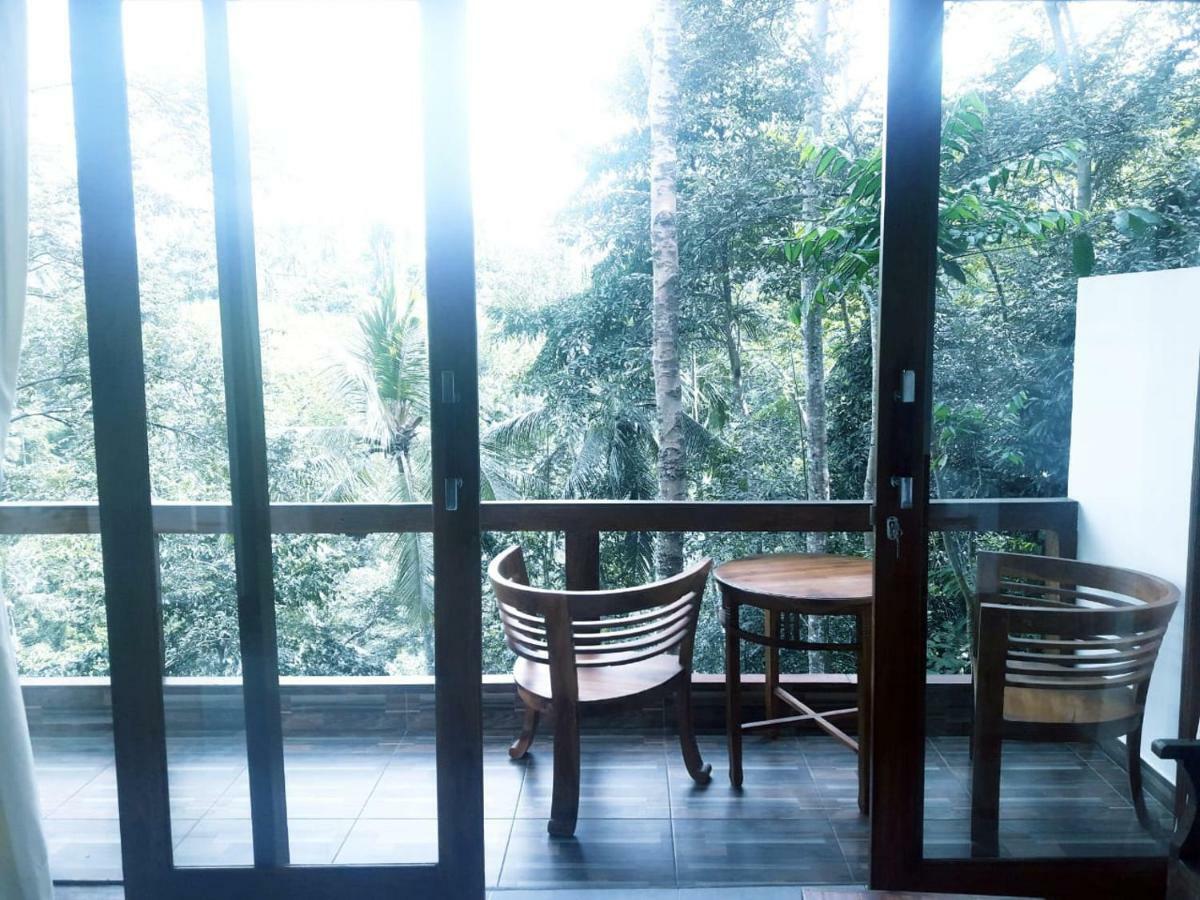 Отель Ubud River Side House Экстерьер фото