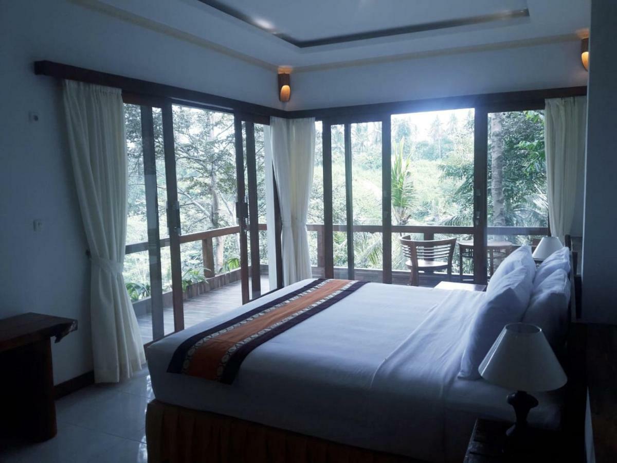 Отель Ubud River Side House Экстерьер фото
