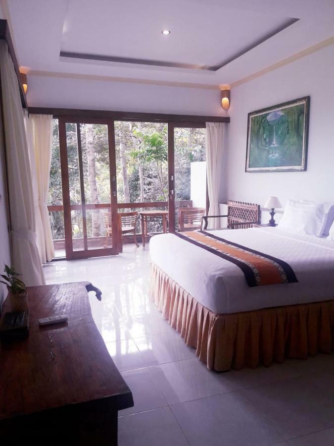 Отель Ubud River Side House Экстерьер фото