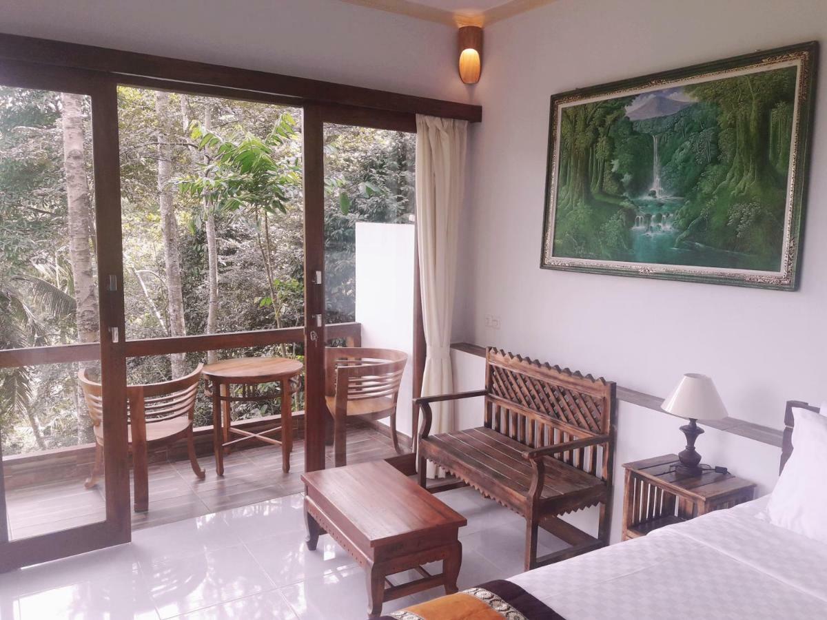 Отель Ubud River Side House Экстерьер фото